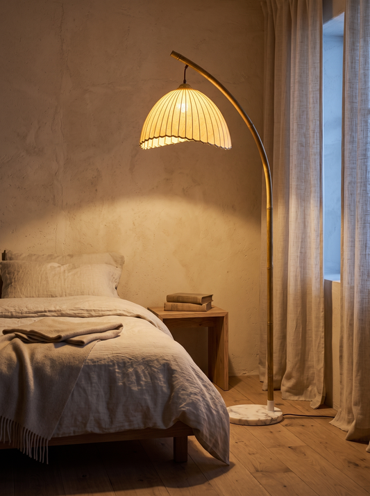Suna floor lamp in a wabi-sabi bedroom at dusk