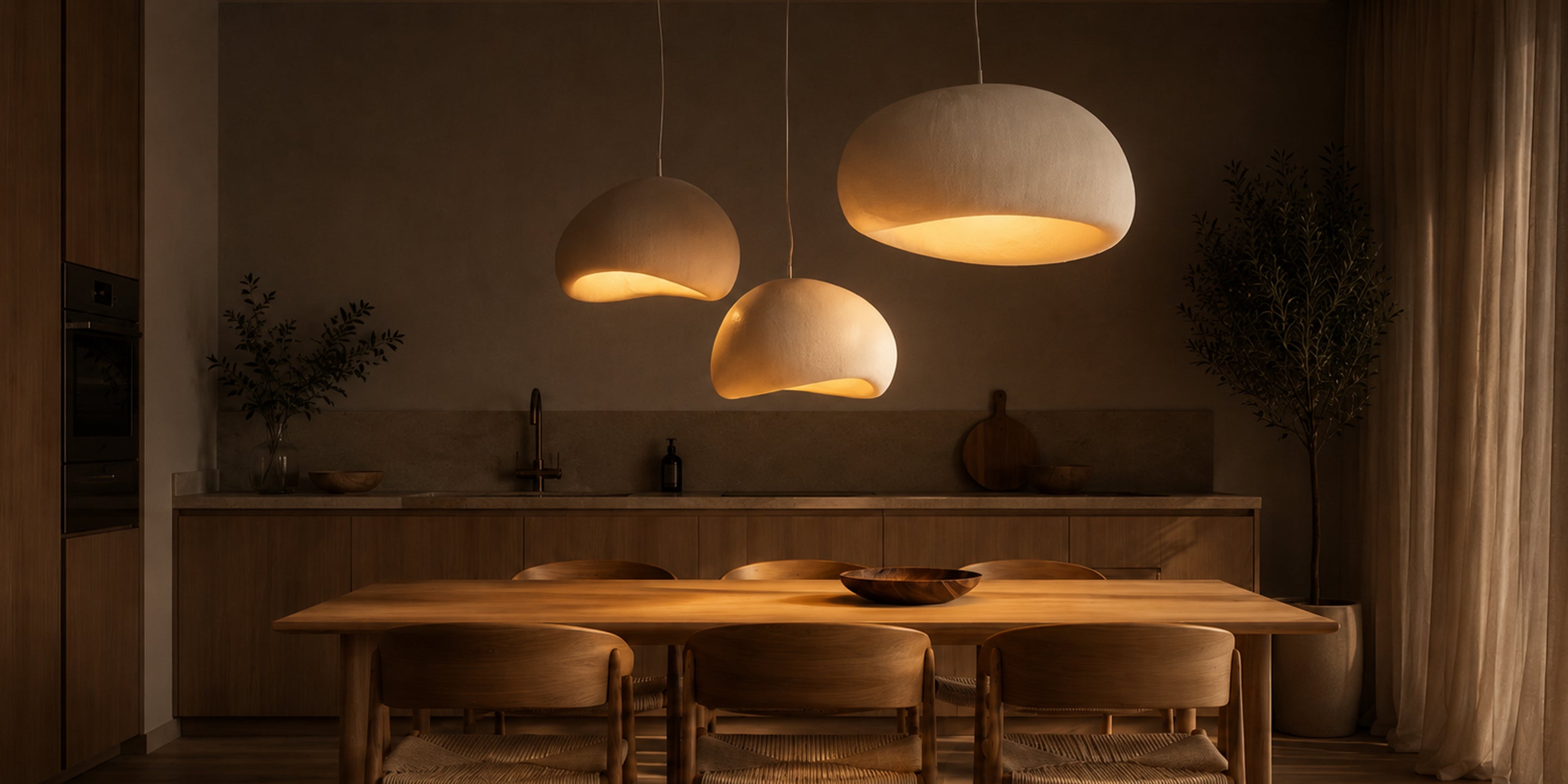 Pendant lighting in a warm, considered interior