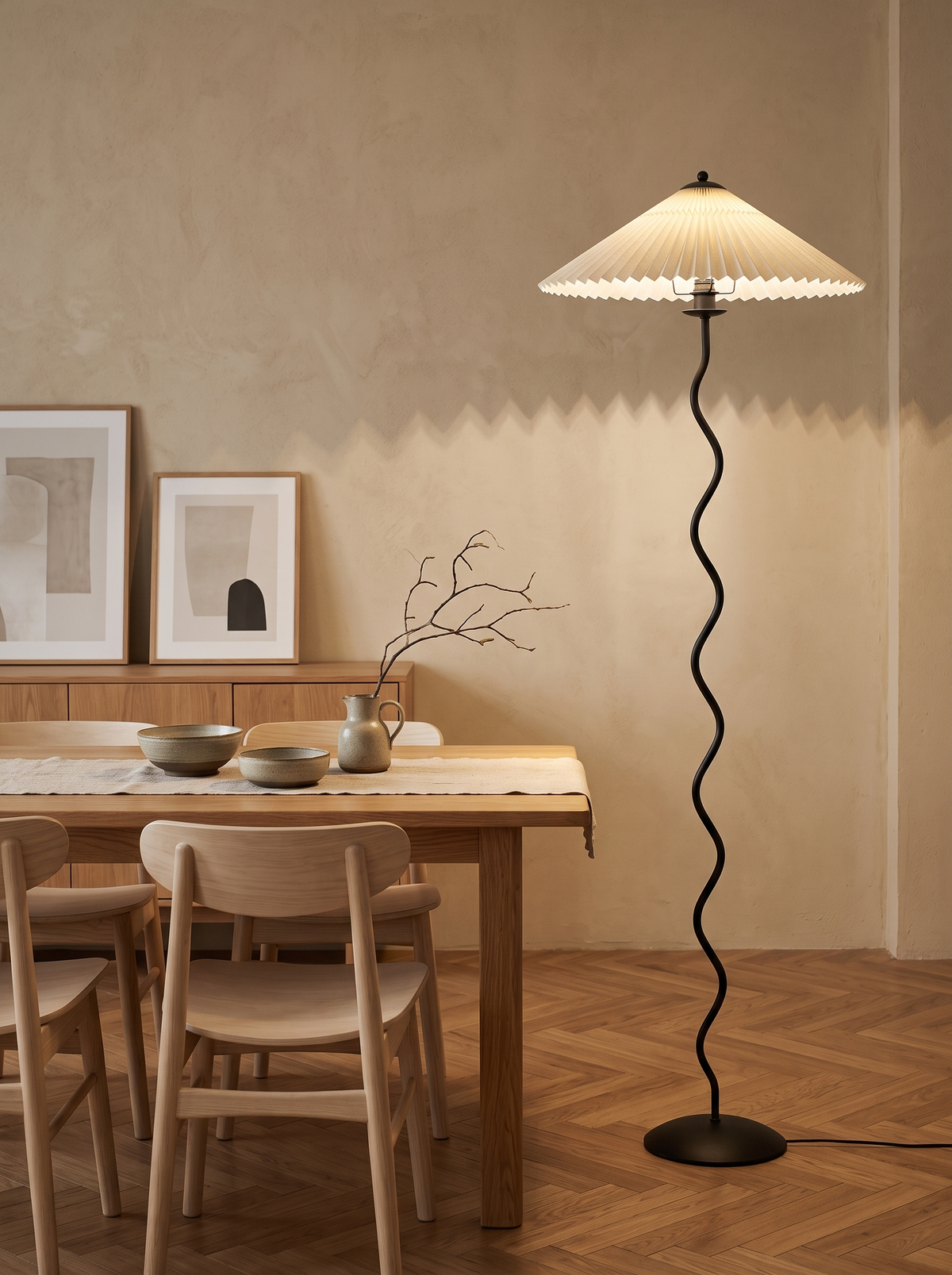 Dune floor lamp beside an oak dining table