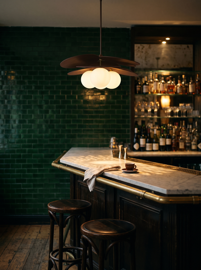 Ashi rattan pendant above a marble cafe bar counter