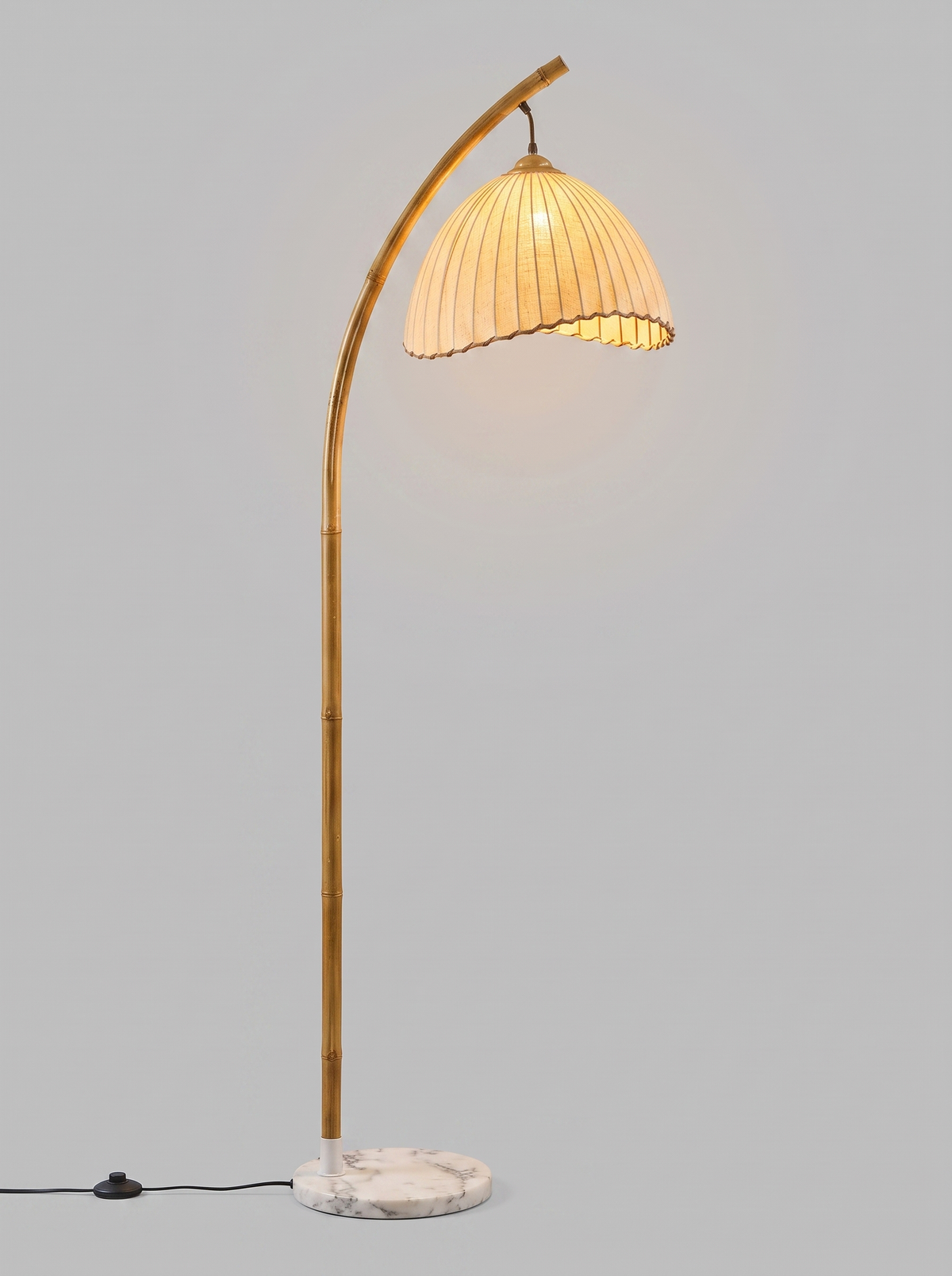 Suna bamboo and fabric floor lamp, studio view, lit