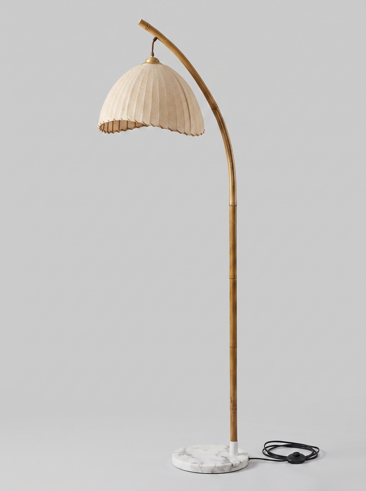 Suna floor lamp three-quarter studio view, unlit