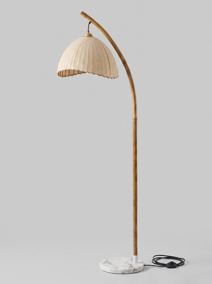 Suna floor lamp three-quarter studio view, unlit