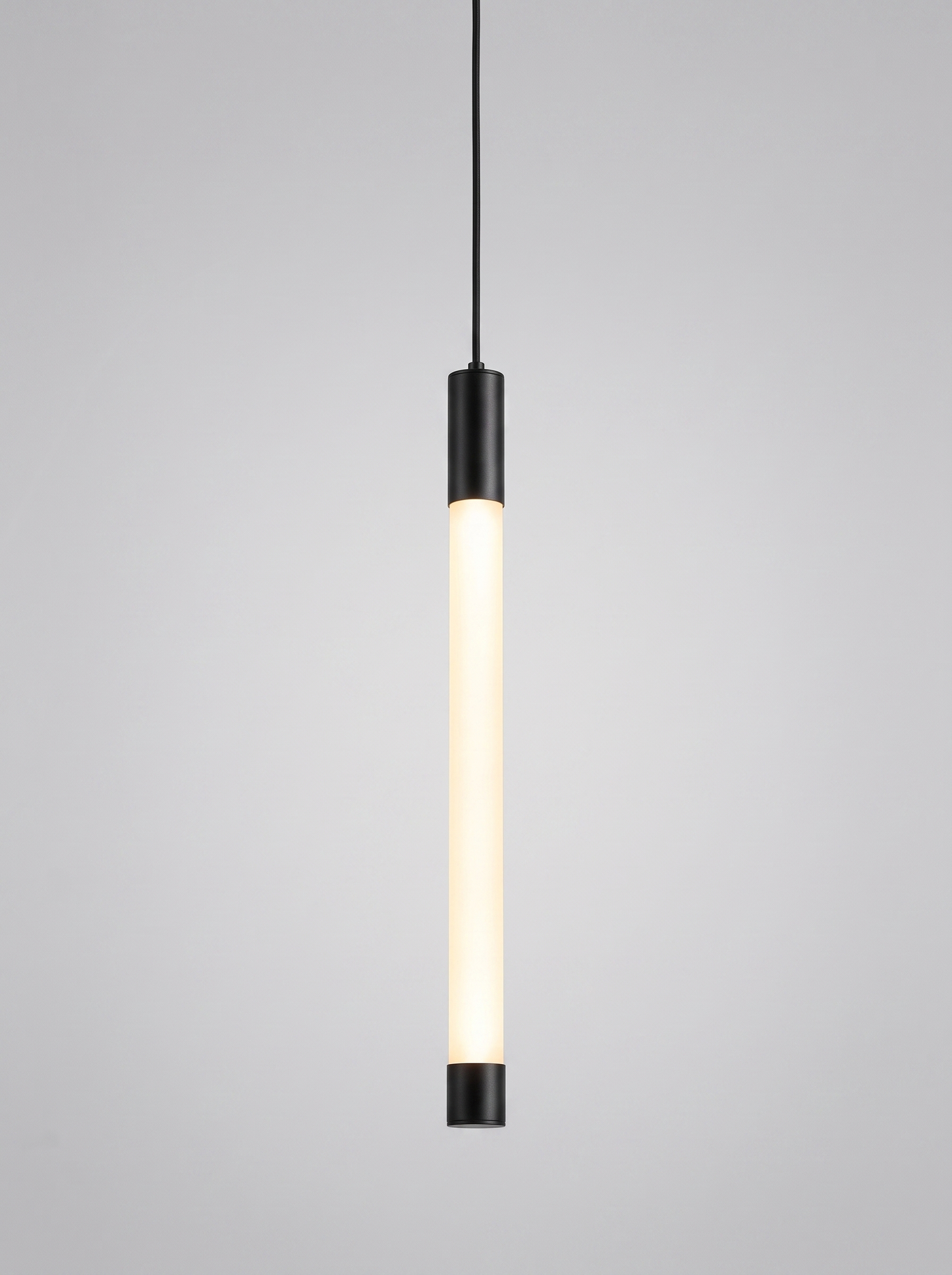 Filo minimalist 360 degree LED bar pendant on light grey studio background
