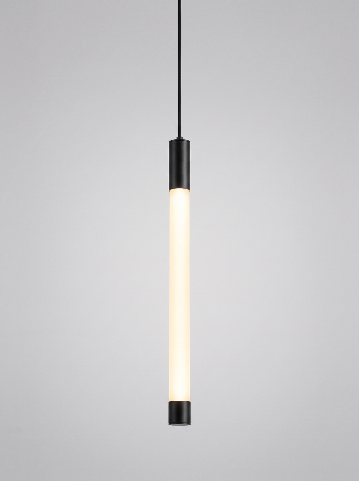 Filo minimalist 360 degree LED bar pendant on light grey studio background