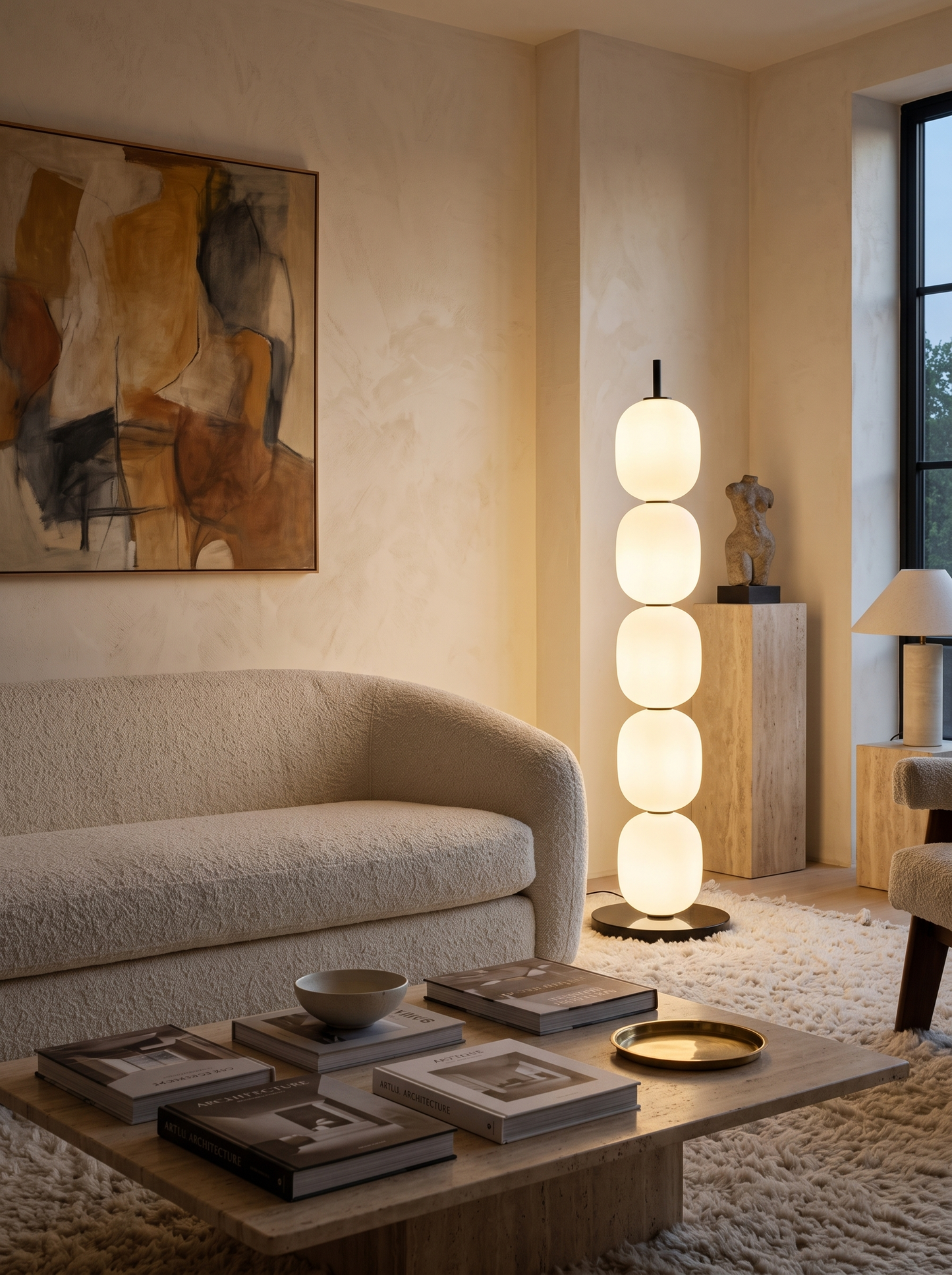 Sasso floor lamp beside a boucle sofa in a contemporary living room