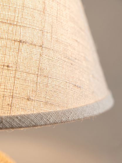 Macro detail of the backlit natural linen shade